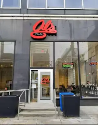 a restaurant with a sign on the side of a building at Luxury High-Rise w/ City View | Paid Parking | Gym in Cleveland