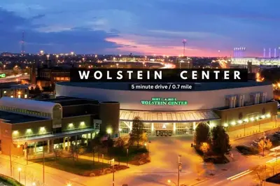 a building with a sign that reads woltten center at night at Large 1BD FLAT in the Heart of Downtown in Cleveland