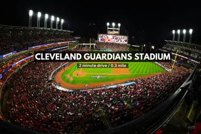 a crowd of people at a baseball game at night at The Halle Downtown 1BD | Parking/Gym/Security in Cleveland