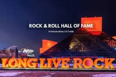 a poster for a rock and roll hall of fame at Central Downtown Loft | Parking•Gym•Security in Cleveland