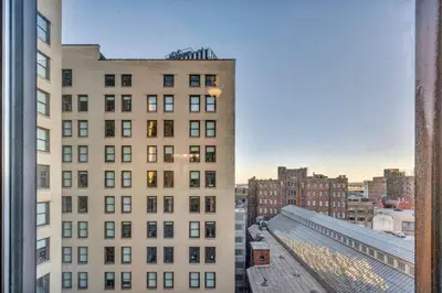 a view of a building from a window at Luxury 2 Bedroom Loft in Heart of Downtown | Gym in Cleveland