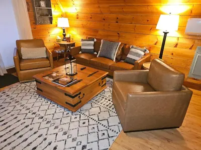 a living room with couches and a coffee table at ForgetMeNot in Wellington