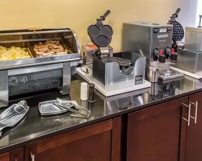 a kitchen with some food on a counter at MainStay Suites Pittsburgh Airport in Imperial