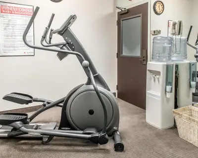 a gym with a elliptical machine in a room at MainStay Suites Pittsburgh Airport in Imperial