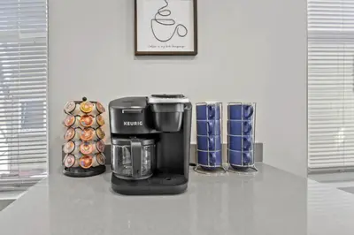 a coffee machine sitting on top of a counter at 230 Entire Complex 2 homes side by side in Columbus
