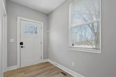 a white room with a door and a window at 293 Perfect for companies in Columbus