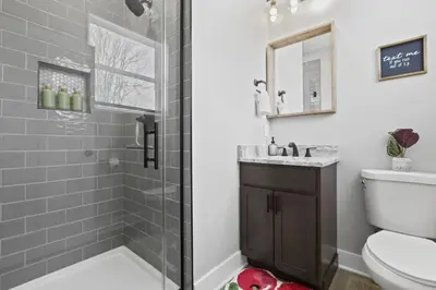 a bathroom with a shower and a toilet and a sink at 293 Perfect for companies in Columbus