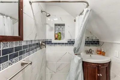 a bathroom with a sink and a shower at 3 Mi to UD and Kettering Health! Suburban Stay in Dayton