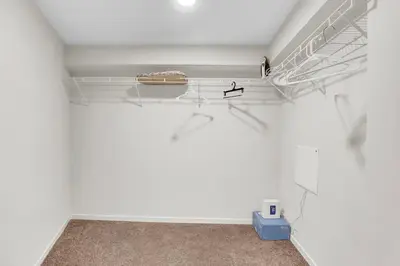 a room with a white room with a refrigerator at LoFi Loft Life DT Cleveland Gym Terrace in Cleveland