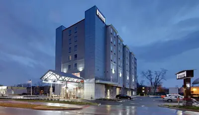 a building with a sign on the front of it at Staybridge Suites - University Area OSU by IHG in Columbus