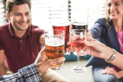 a group of people holding glasses of beer at Staybridge Suites - University Area OSU by IHG in Columbus