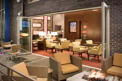 a dining room with chairs and tables at Hyatt Place Cleveland/Westlake/Crocker Park in Westlake