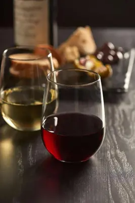 two glasses of wine sitting on a table at Hyatt Place Cleveland/Westlake/Crocker Park in Westlake