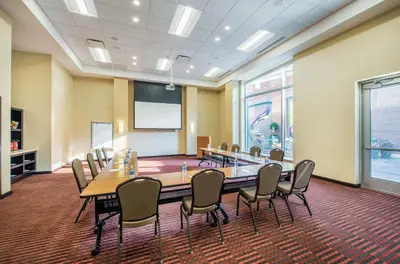 a conference room with a long table and chairs at Hyatt Place Cleveland/Westlake/Crocker Park in Westlake