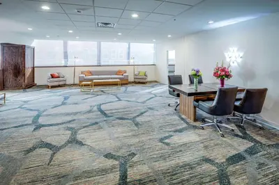 an office with a large rug on the floor at DoubleTree by Hilton Huntington, WV in Huntington