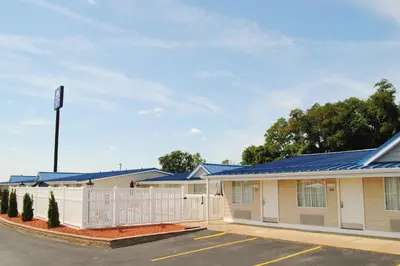 a building with solar panels on it at Americas Best Value Inn & Suites St Clairsville Wheeling in Saint Clairsville