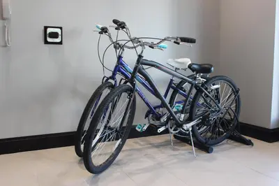 a blue bike parked next to a wall at Staybridge Suites Miamisburg by IHG in Miamisburg