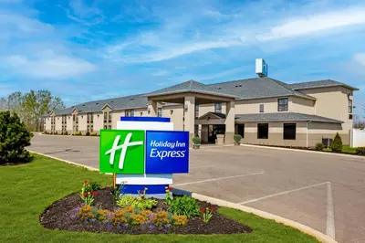 a sign in front of a building at Holiday Inn Express London-I-70 by IHG in London