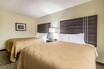 a hotel room with two beds and a window at Quality Inn & Suites North Lima - Boardman in North Lima