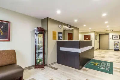 a waiting room with a counter and a phone booth at Quality Inn & Suites North Lima - Boardman in North Lima