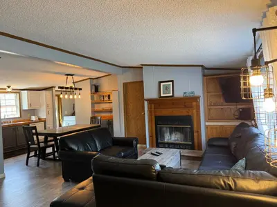 a living room with a couch and a fireplace at Put-in-Bay Island Club #71 in Put-in-Bay