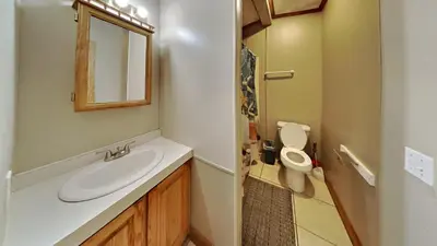 a bathroom with a sink and a toilet at Put-in-Bay Island Club #74 in Put-in-Bay