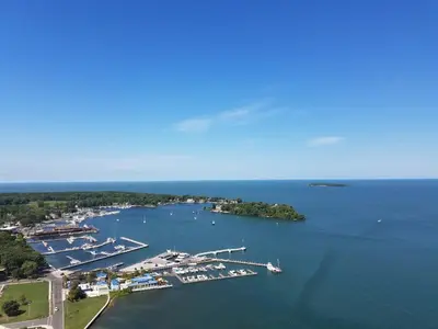 an aerial view of a harbor with boats in the water at Put-in-Bay Poolview Condo #5 in Put-in-Bay