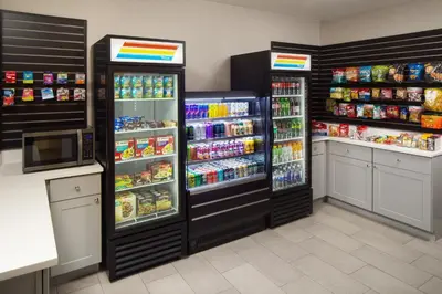 a store with two refrigerators in a store at Holiday Inn Weirton-Steubenville Area in Weirton