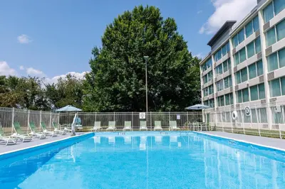 a swimming pool in front of a hotel at Holiday Inn Weirton-Steubenville Area in Weirton