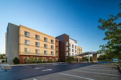 an empty parking lot in front of a building at Fairfield Inn & Suites by Marriott Akron Stow in Stow