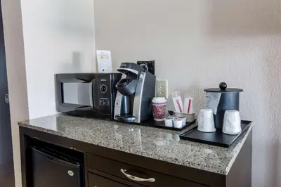 a kitchen counter with a coffee maker and a microwave at Hilton Garden Inn Columbus/Dublin in Dublin