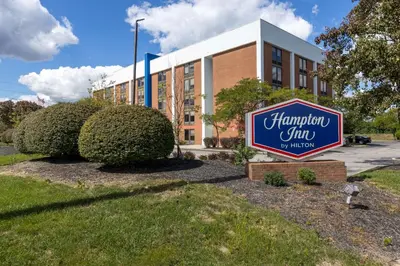 a sign for a hampton inn in front of a building at Hampton Inn Columbus/Dublin in Dublin