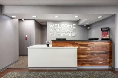 a welcome to theuckyeye slice counter in a hospital lobby at Hampton Inn Columbus/Dublin in Dublin