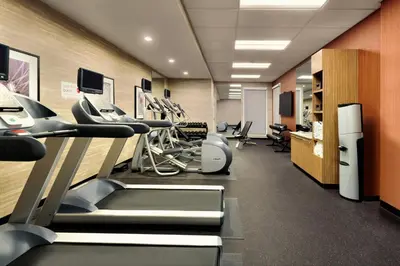 a gym with treadmills and elliptical machines at TownePlace Suites by Marriott Pittsburgh Airport/Robinson Township in Robinson Township