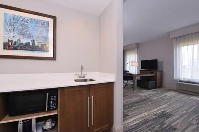 a room with a kitchen with a sink and a microwave at Hampton Inn & Suites Cincinnati-Mason, Ohio in Mason