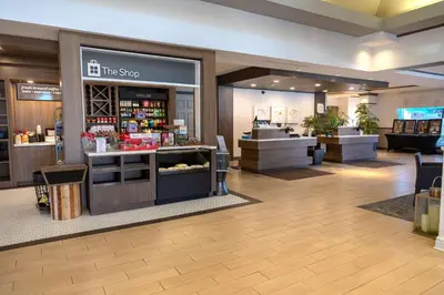 a store with a counter in the middle of a room at Hilton Garden Inn Pittsburgh/Southpointe in Canonsburg