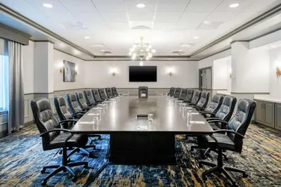 a conference room with a large table and chairs at Hilton Garden Inn Pittsburgh/Southpointe in Canonsburg