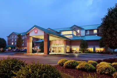 a hotel with a sign on the front of it at Hilton Garden Inn Pittsburgh/Southpointe in Canonsburg