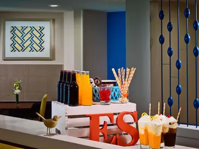 a table with drinks and a no sign on it at Sonesta ES Suites Cincinnati - Sharonville East in Sharonville