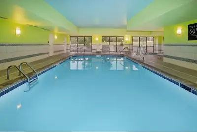 a large swimming pool in a hotel room at Hampton Inn Cincinnati Northwest Fairfield in Fairfield