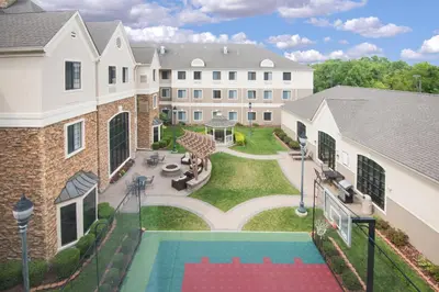 an aerial view of the courtyard of a house with a swimming pool at Staybridge Suites Columbus-Airport by IHG in Columbus