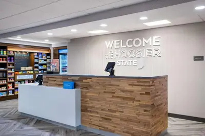 a welcome to the holker state sign in a store lobby at Hampton Inn & Suites Muncie in Muncie