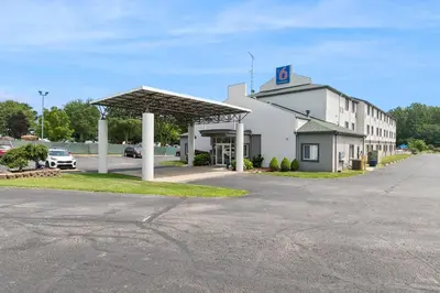 a gas station with a sign on top of it at Motel 6-Milan, OH - Sandusky in Milan