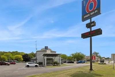 a street sign in front of a gas station at Motel 6-Milan, OH - Sandusky in Milan