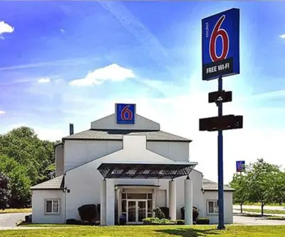 a gas station with a sign in front of it at Motel 6-Milan, OH - Sandusky in Milan