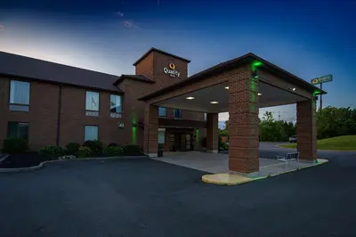 a building with a parking lot in front of it at Quality Inn I-75 West Chester-North Cincinnati in West Chester