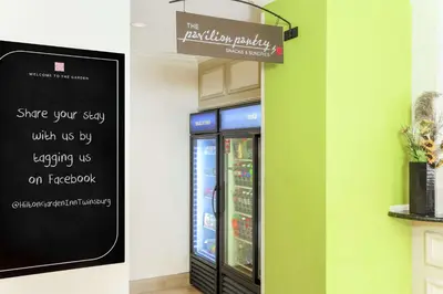 a sign for a vending machine in a store at Hilton Garden Inn Cleveland/Twinsburg in Twinsburg