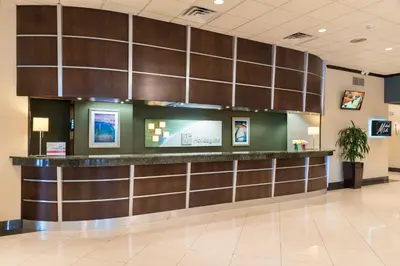 a lobby of a hospital with a counter at Holiday Inn Cleveland - South Independence by IHG in Independence