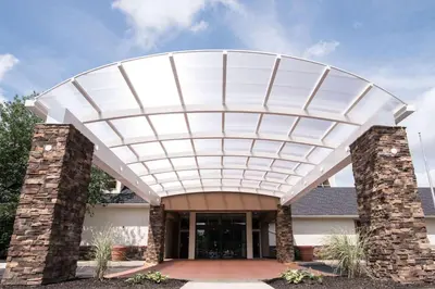 awning over the entry to a building at Wyndham Garden Westlake in Westlake