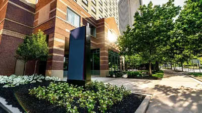 a building with a blue sculpture in front of it at Sonesta Columbus Downtown in Columbus